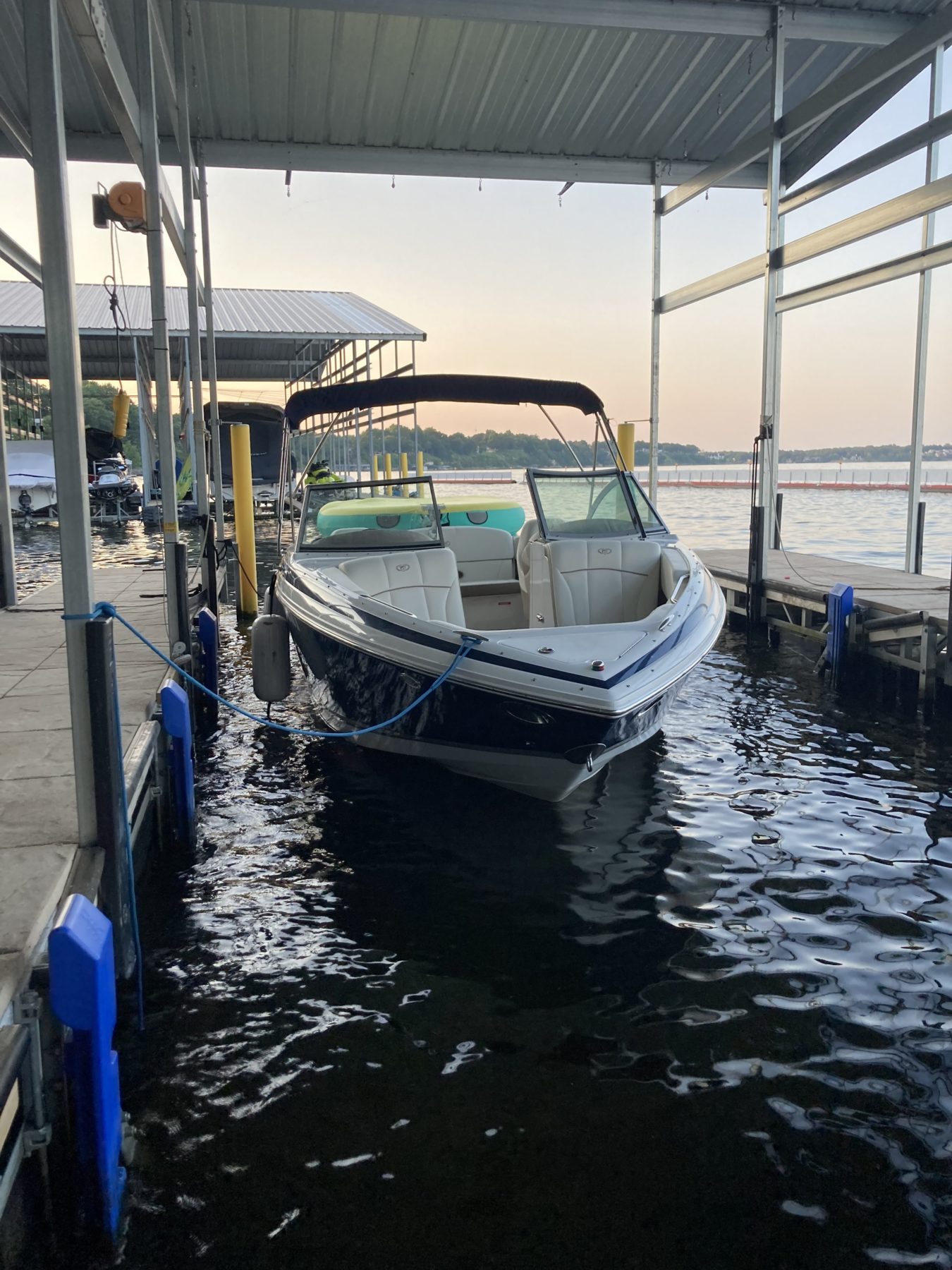 Boat on at the dock of the Grand Lake O' the Cherokee