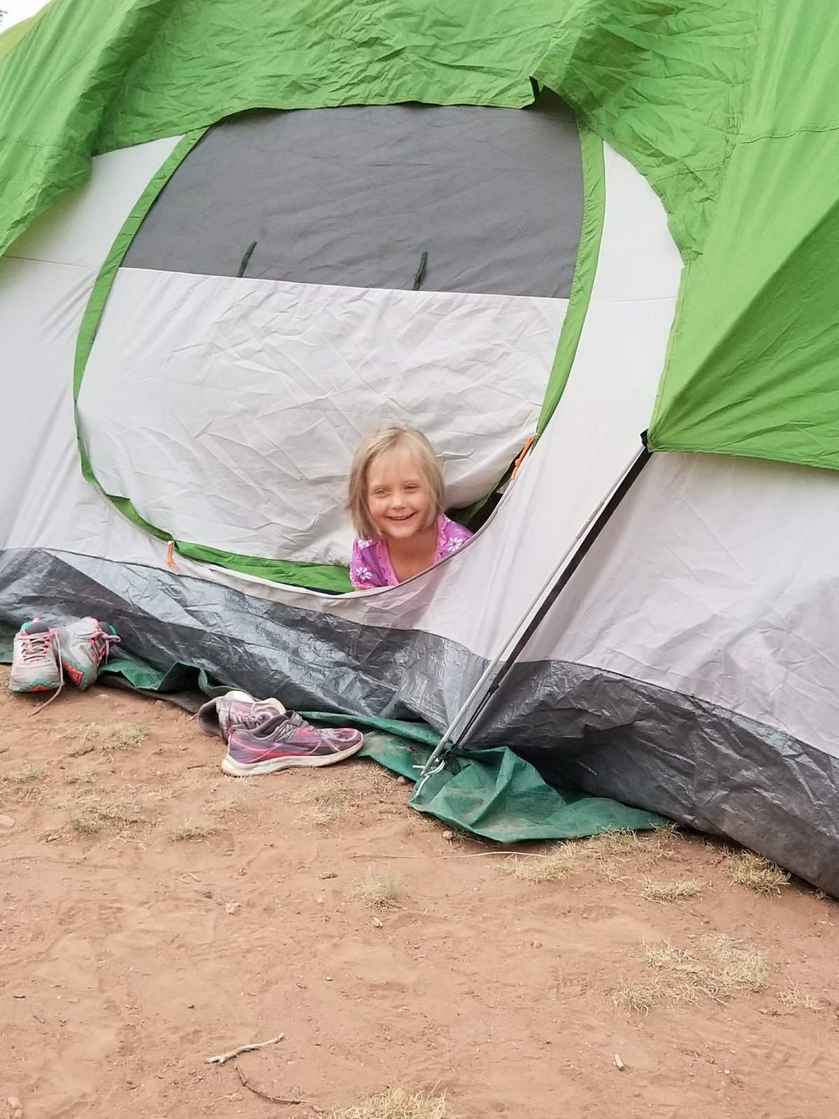 Camping gifts for families Tent with little Girl peeking out