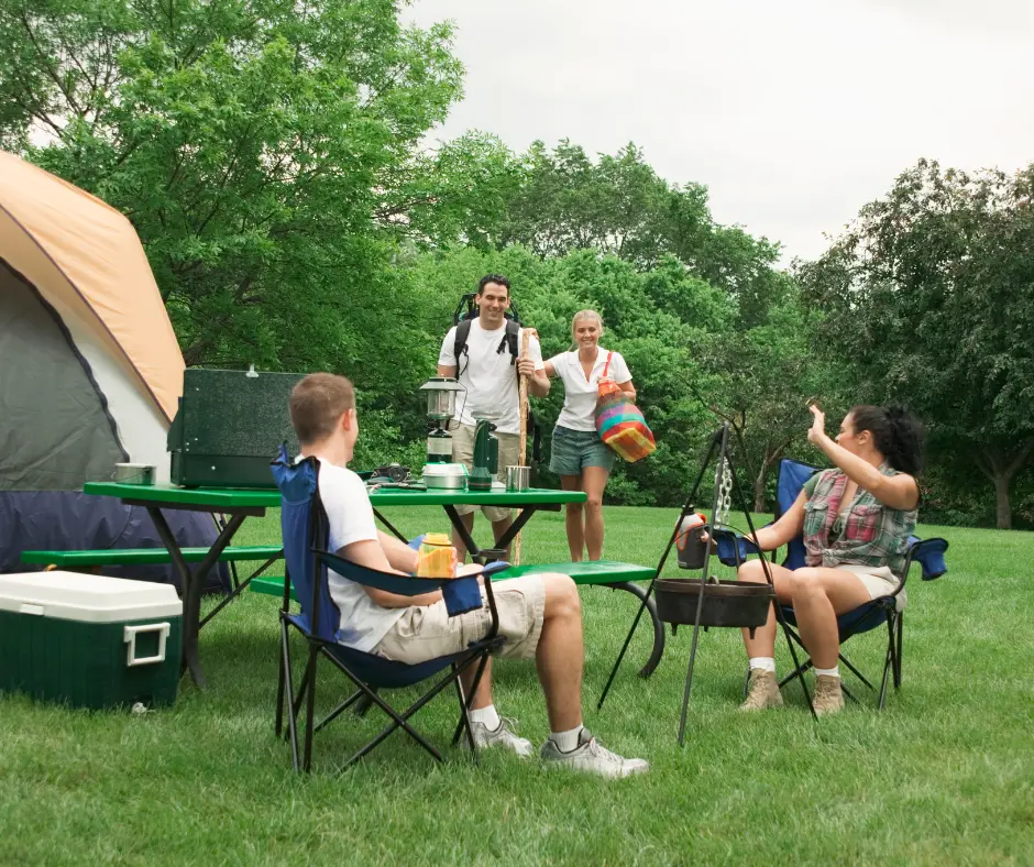 Camping Gifts family picnicing and camping with a Cooler