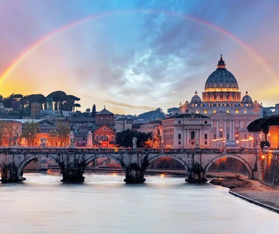 Beautiful view of Rome and Vatican City. Rainbow over the area.