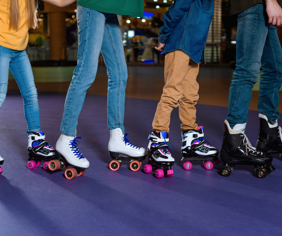 a group of people wearing roller skates