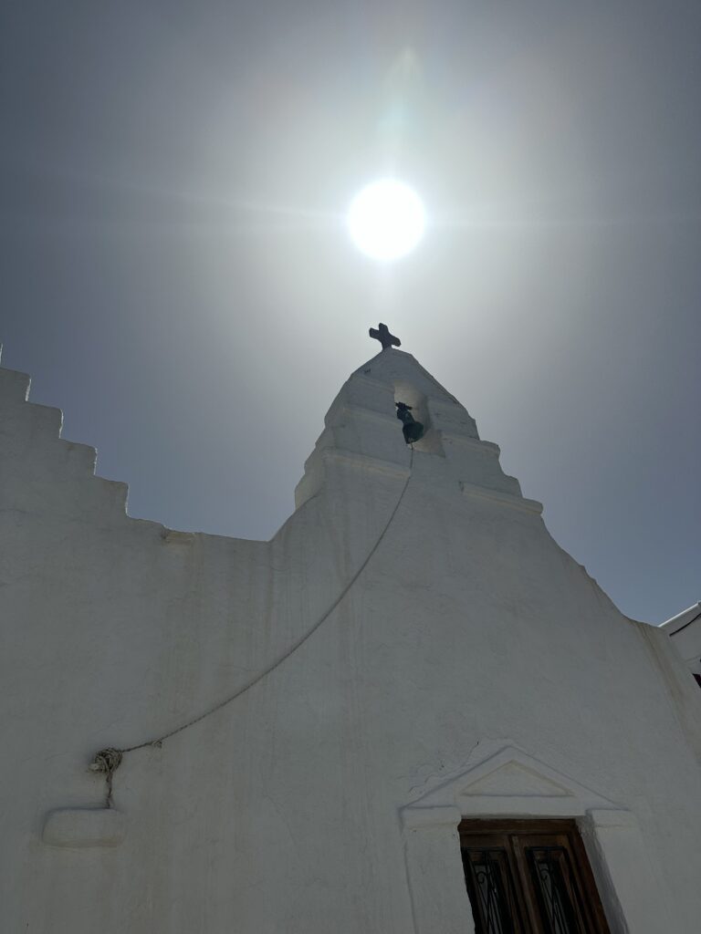 Mykonos church with sun